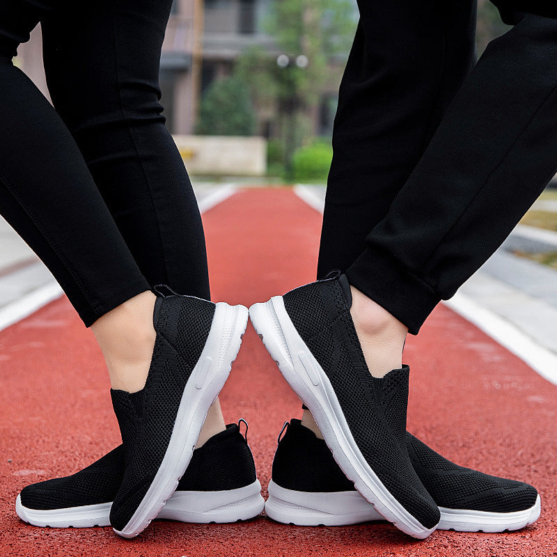 Women's slip-on knit trainer with sock-like shaft, pull tab, and responsive cushioning Mune Fashion