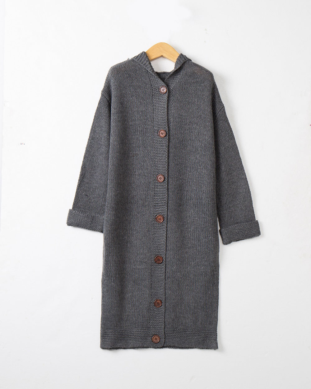 Women's Hooded Long Cardigan made of medium-thick ribbed knit with a full button placket and loose oversized cut Mune Fashion
