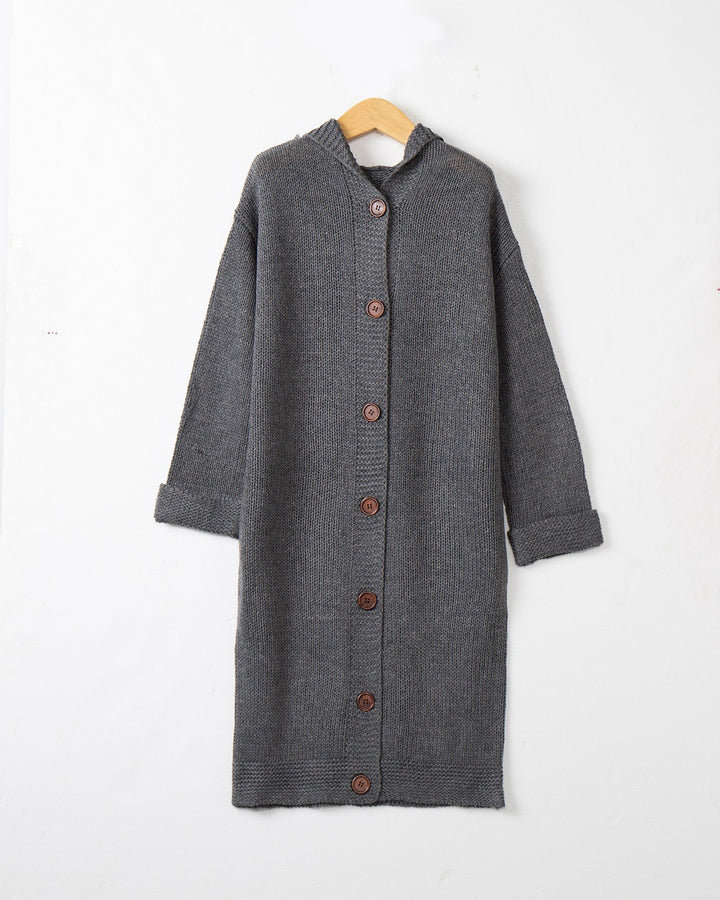 Women's Hooded Long Cardigan made of medium-thick ribbed knit with a full button placket and loose oversized cut Mune Fashion