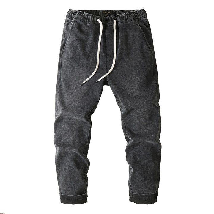 Men's denim joggers with elastic waistband, drawstring, and rolled hem Mune Fashion