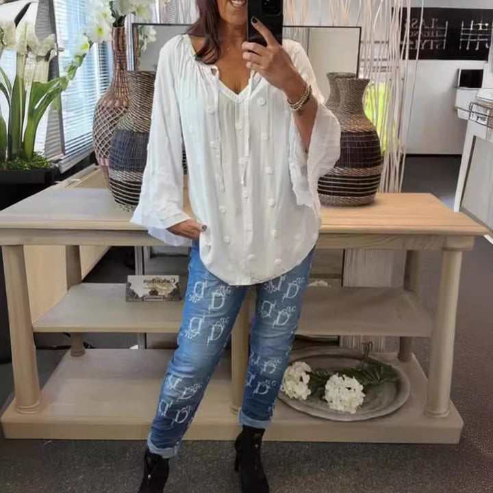Women's lightweight Boho tunic with V-neck, three-dimensional dot texture and ruffle bell sleeves Mune Fashion