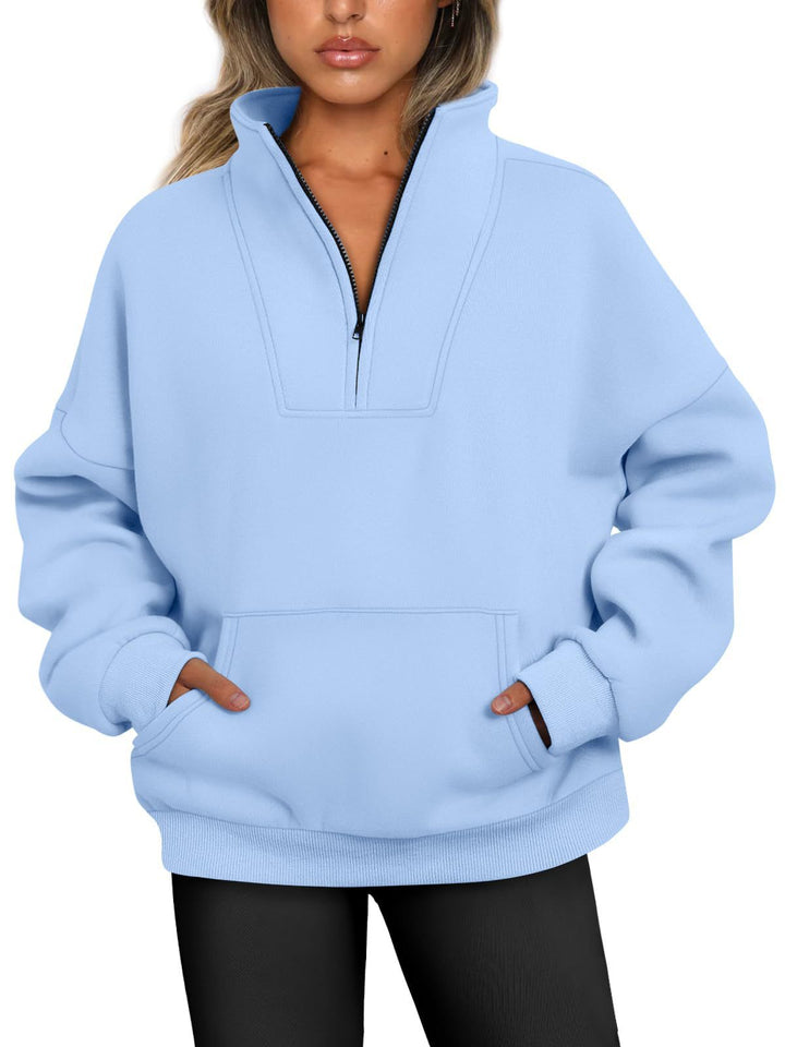 Women's oversized half-zip hoodie with high stand collar, kangaroo pocket, and ribbed cuffs Mune Fashion
