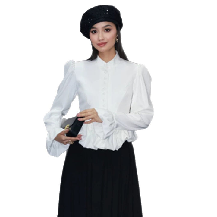 Ladies tailored peplum blouse with stand-up collar, covered button placket and puff sleeves Mune Fashion
