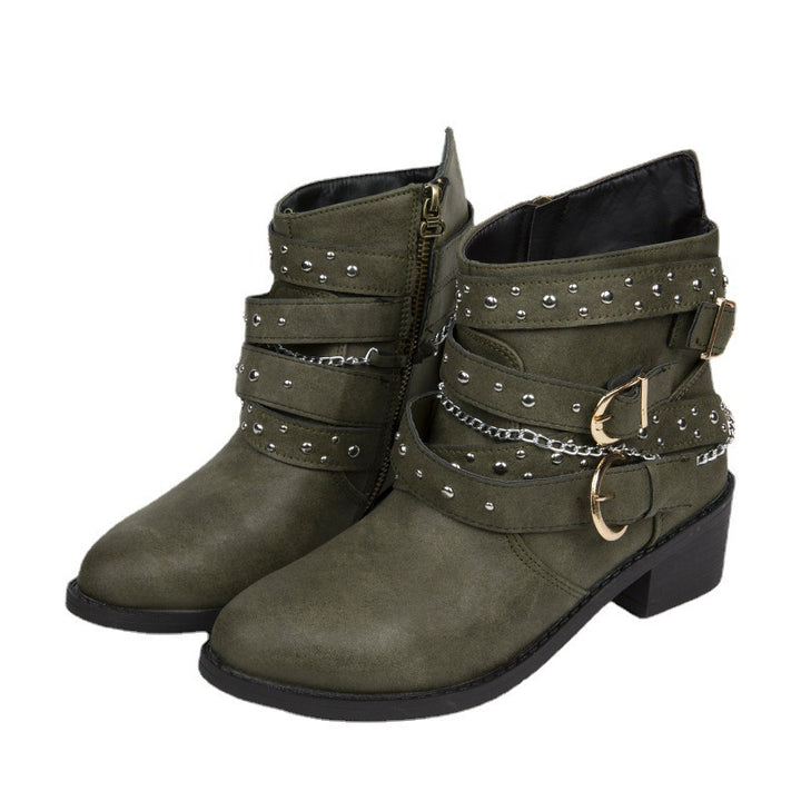 Women's ankle-height biker ankle boots with studded strap, chain and buckle details Mune Fashion