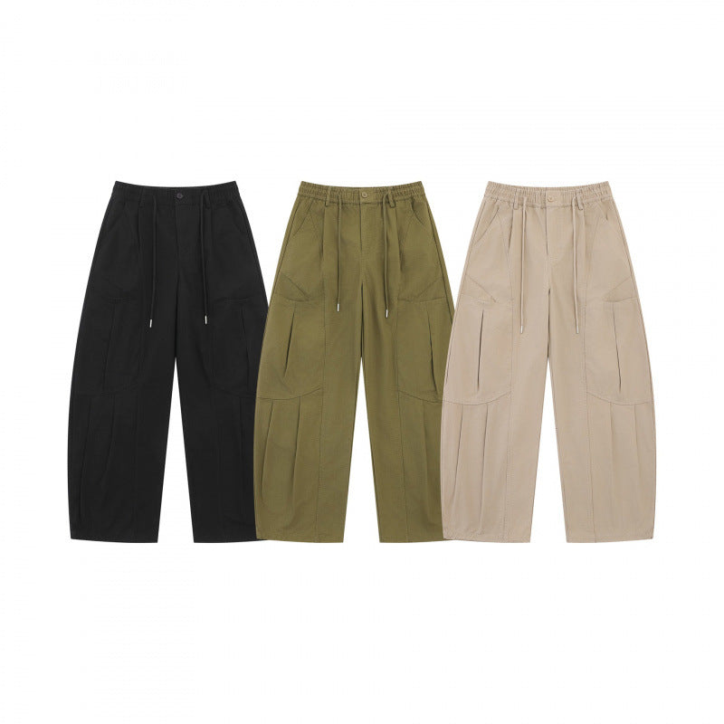 Unisex Wide Utility Cargo Pants made of cotton blend with drawstring waistband, large patch pockets, and balloon-shaped silhouette Mune Fashion