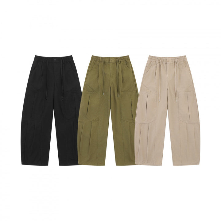 Unisex Wide Utility Cargo Pants made of cotton blend with drawstring waistband, large patch pockets, and balloon-shaped silhouette Mune Fashion