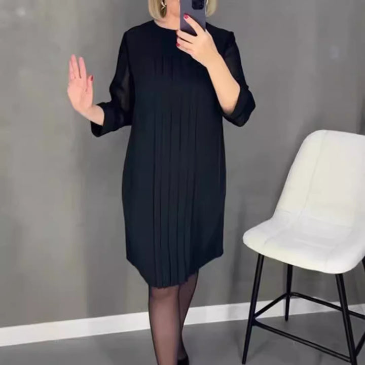 Ladies nan pleated sheath dress with knee-length silhouette and transparent three-quarter sleeves Mune Fashion