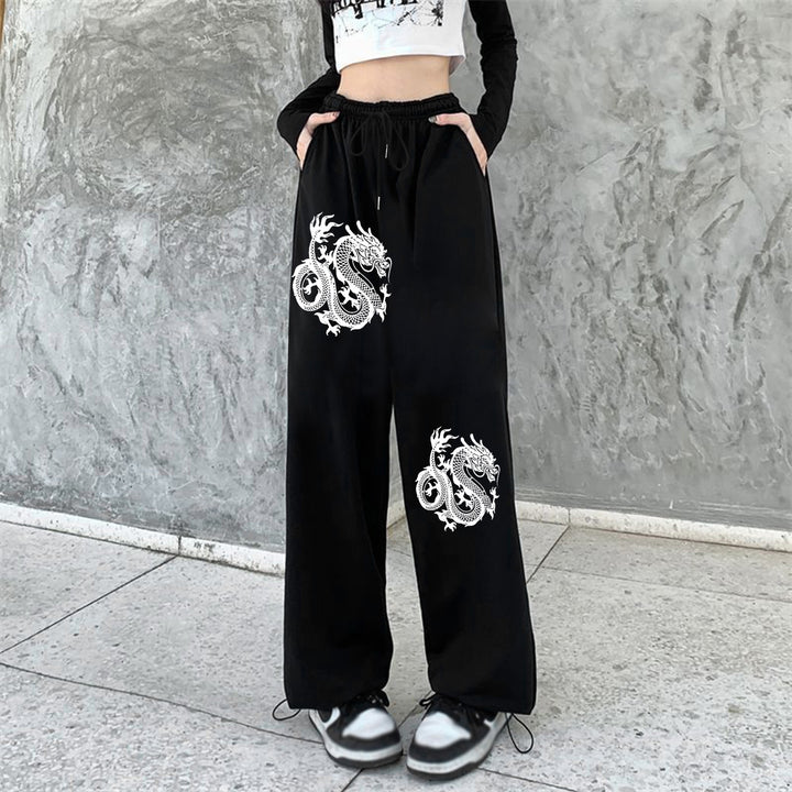 Women's high-waisted jogging pants with side statement print and elastic waistband Mune Fashion