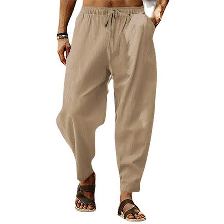 Men's relaxed summer slouch pants made of linen blend with elastic waistband and tapered ankle cuffs Mune Fashion