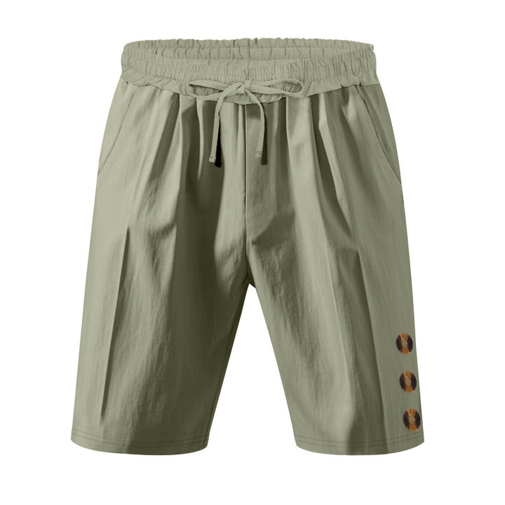 Men's knee-length casual Bermuda shorts with elastic tunnel drawstring waist, side slit pockets, and round decorative appliqués Mune Fashion