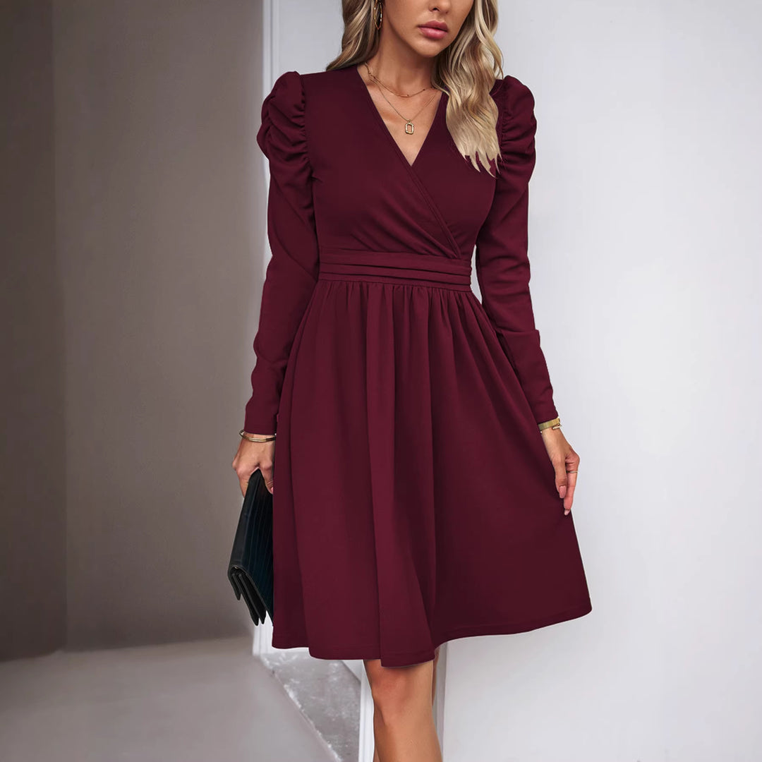 Women's wrap dress with V-neck, gathered puff sleeves, and fitted pleated skirt Drune