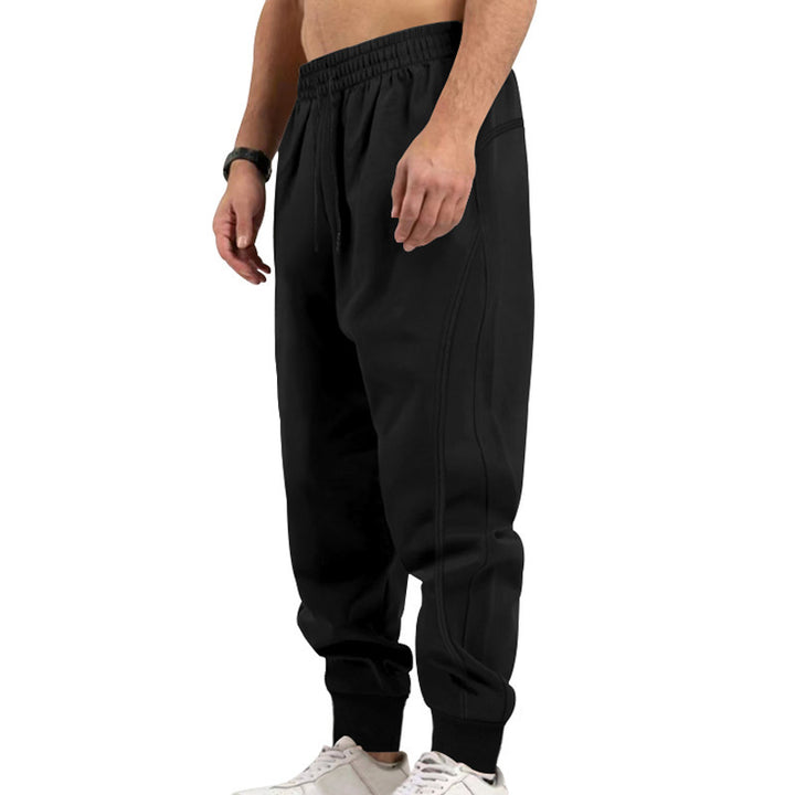 Men's versatile sweat jogging pants with ergonomic knee inserts, elastic comfort waistband, and concealed zip pockets Mune Fashion