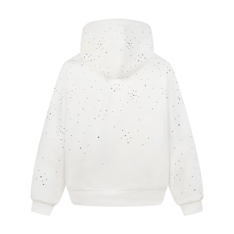 Women’s hoodie with statement print, metallic lettering and paint splatter look Mune Fashion
