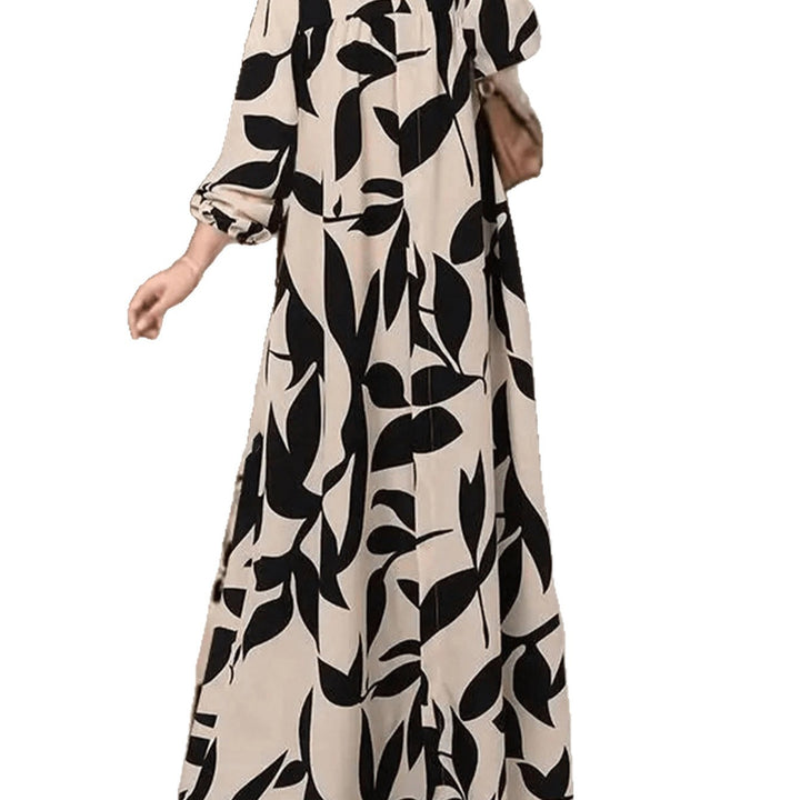 Women's maxi dress with loose A-line cut, flowing fit and eye-catching leaf print Mune Fashion