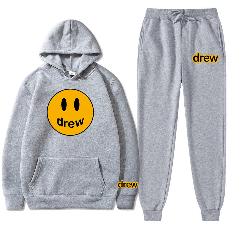 Unisex two-piece lounge set made of French terry with smiley print hoodie and tapered jogger pants Mune Fashion