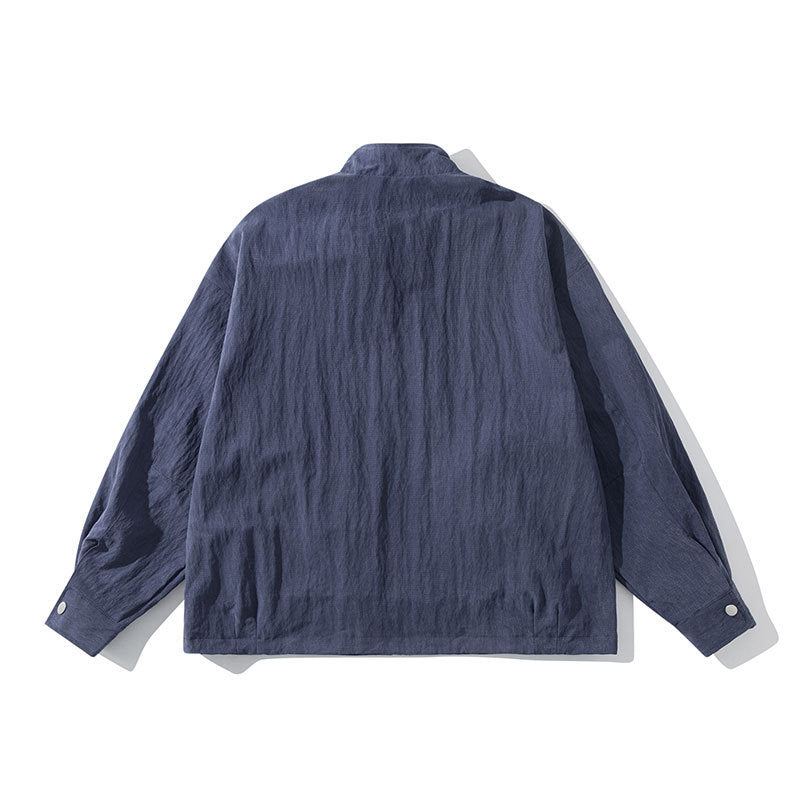Men's Lightweight Windbreaker with Stand-Up Collar, Raglan Sleeves and Snap Button Pockets Mune Fashion
