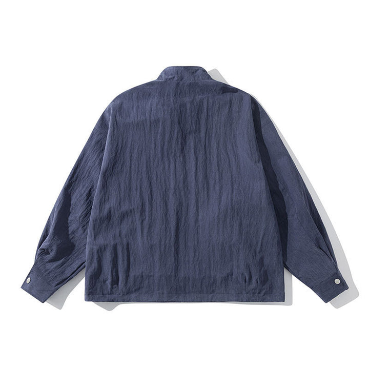 Men's Lightweight Windbreaker with Stand-Up Collar, Raglan Sleeves and Snap Button Pockets Mune Fashion
