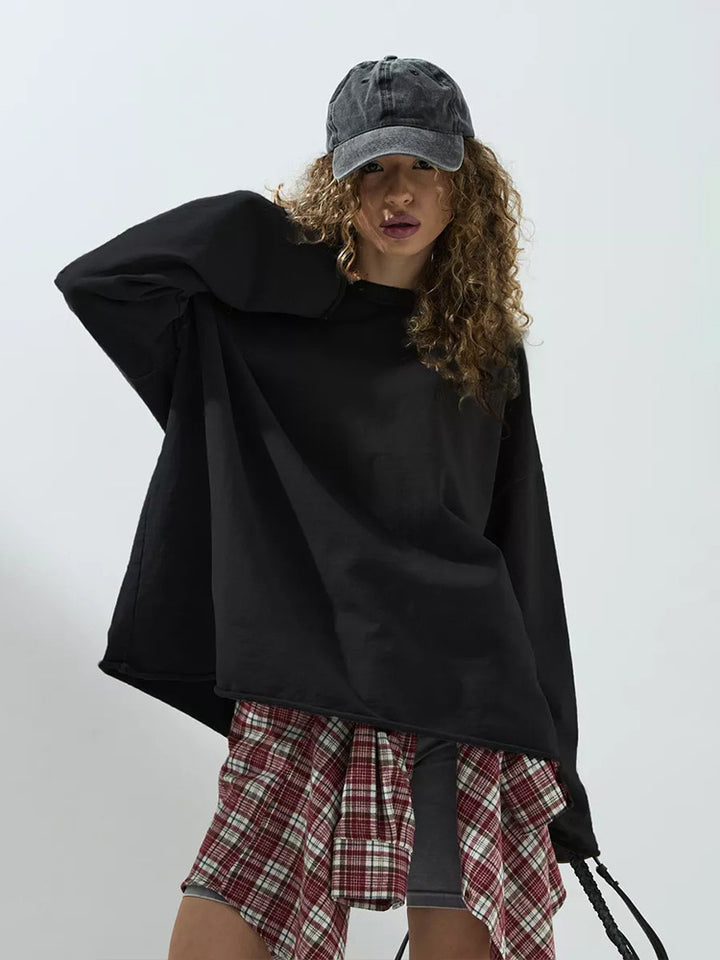 Women's loose sweatshirt with round neckline and extended oversized cut Mune Fashion