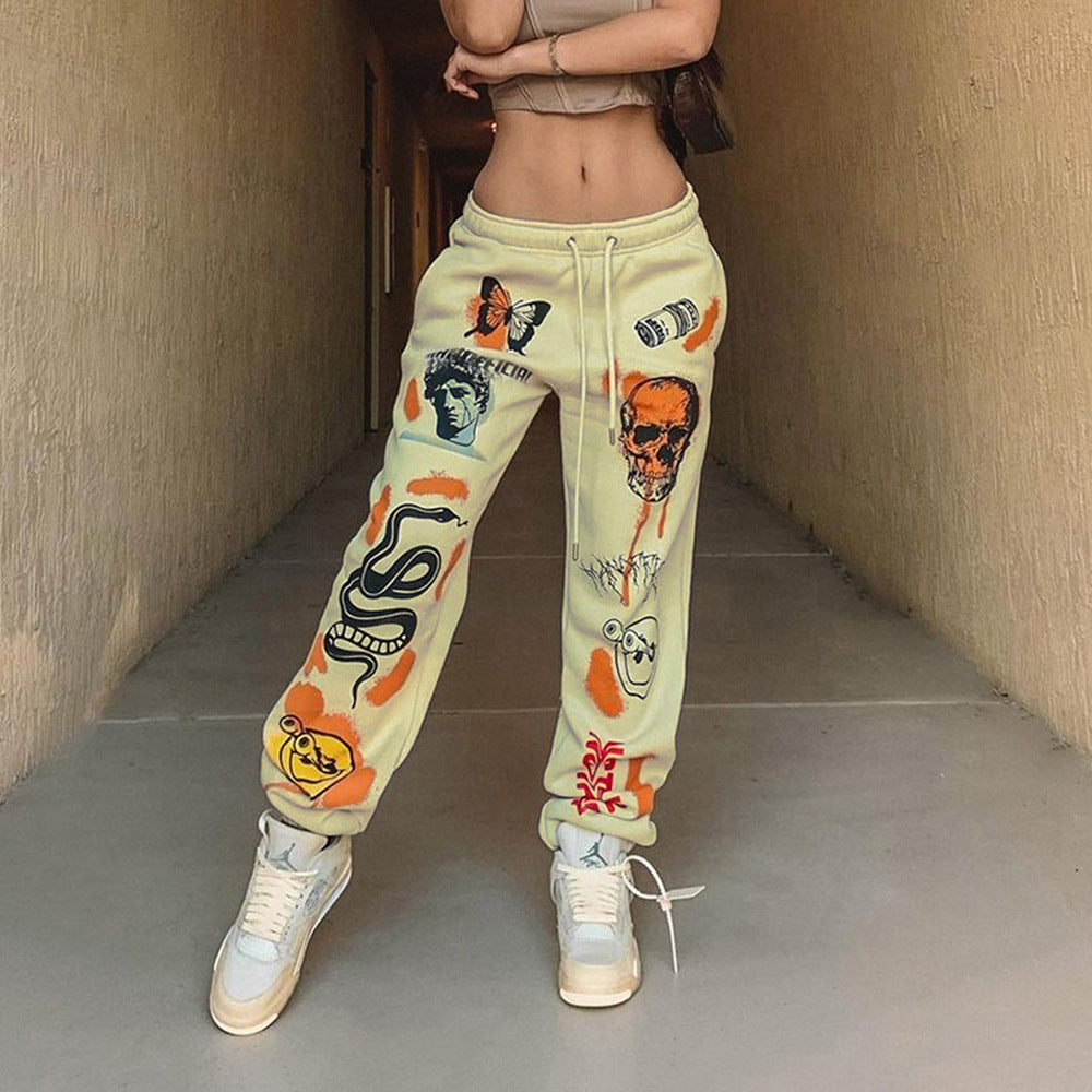 Women's graphic joggers with a high waistband, drawstring, and streetwear prints Mune Fashion