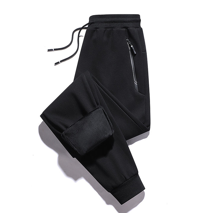 Men's thermo fleece jogging pants with brushed inner side, reflective zipper pockets and drawstring waistband Mune Fashion