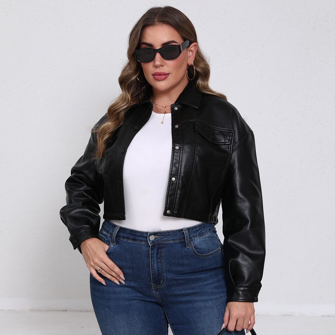Women nan short oversized faux leather jacket in trucker style with flap pockets and concealed snap button placket Mune Fashion