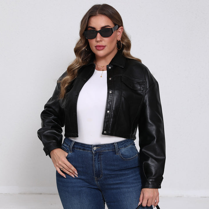 Women nan short oversized faux leather jacket in trucker style with flap pockets and concealed snap button placket Mune Fashion