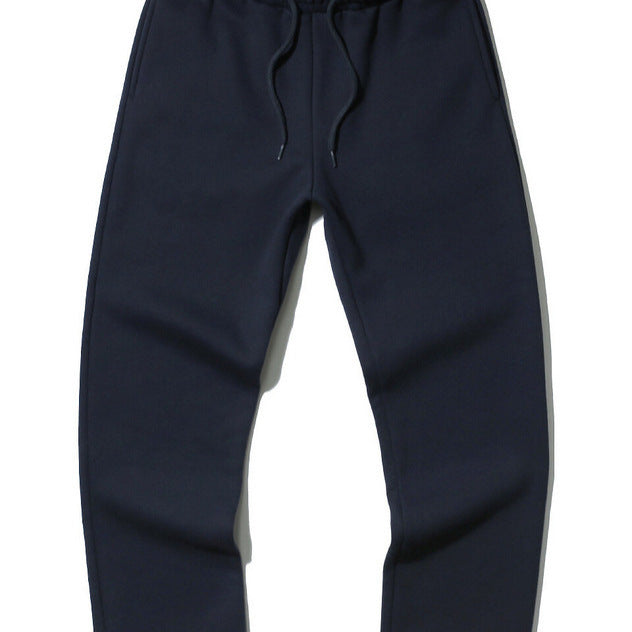 Unisex modern Relax Jogging pants with elastic drawstring waistband, side pockets, and tapered leg Mune Fashion
