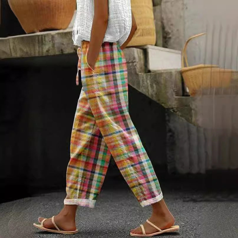 Women's checked linen trousers in palazzo cut with elastic tunnel drawstring waistband and rolled ankle hem Mune Fashion