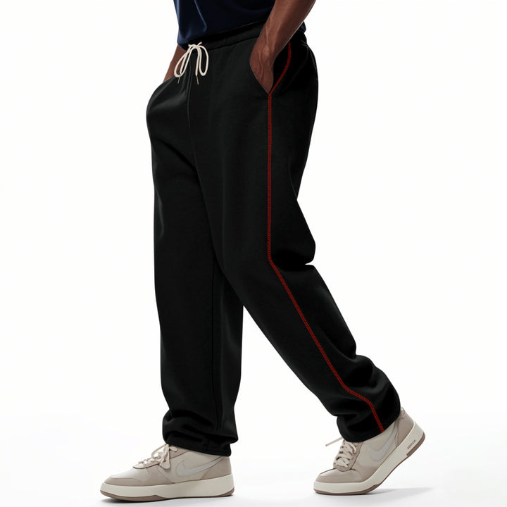 Men's casually fitting sweatpants with side decorative seam, elastic comfort waistband, and deep side pockets Mune Fashion