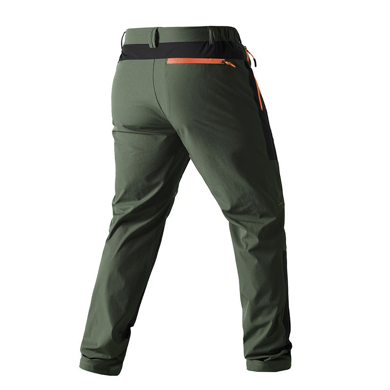 Men's functional trekking pants with reinforced knees, elastic waistband, and zipper pockets.