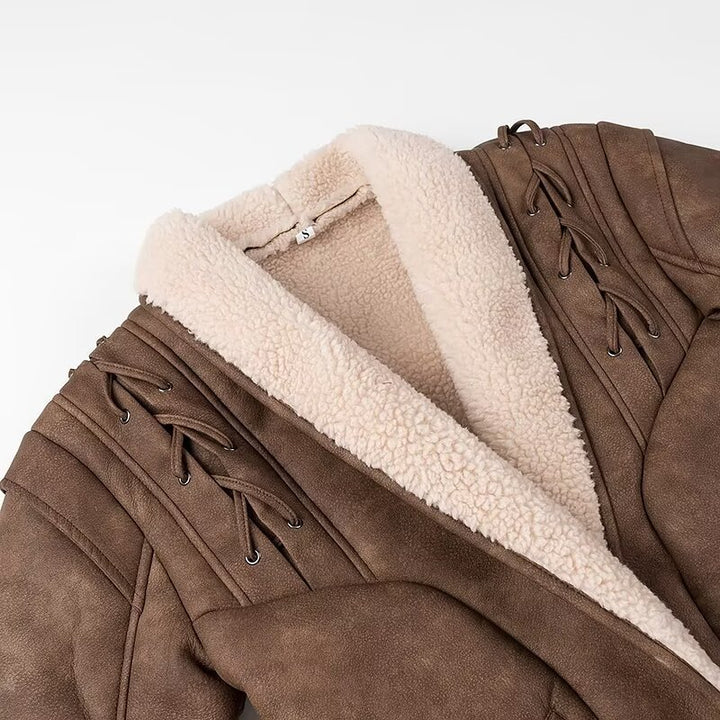 Ladies short jacket in aviator look with sherpa lining, tie belt and shoulder lacing Mune Fashion