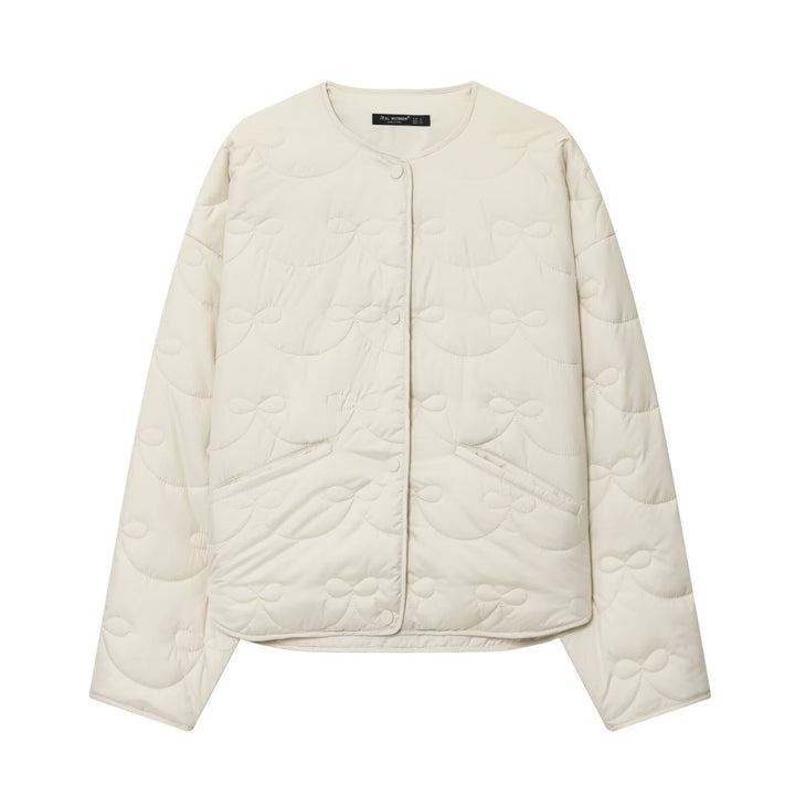 Women’s quilted jacket without collar with decorative bow quilting and snap button closure Mune Fashion