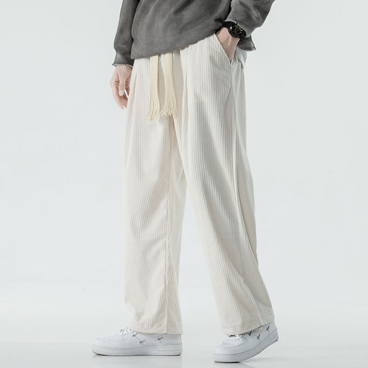 Men's loose-fitting corduroy pants with wide leg, elastic waistband and decorative drawstring Mune Fashion