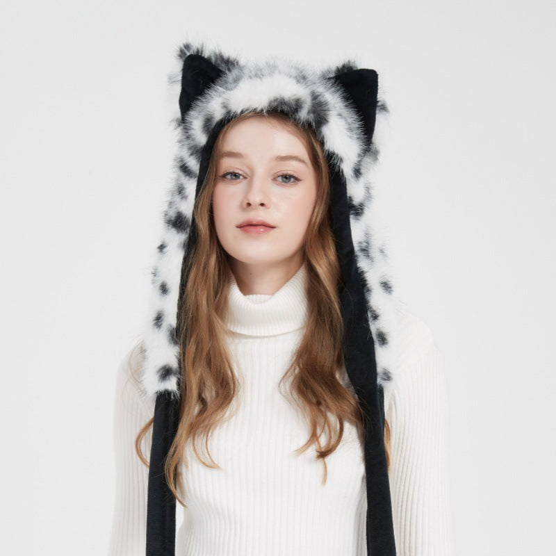 Ladies hooded stole made of luxurious faux fur with long scarf tails and pompom ends Mune Fashion