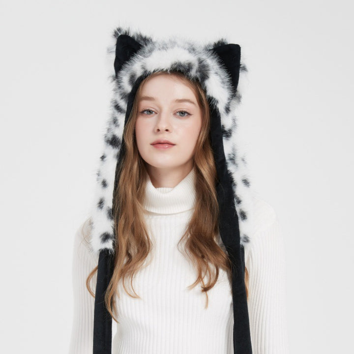 Ladies hooded stole made of luxurious faux fur with long scarf tails and pompom ends Mune Fashion