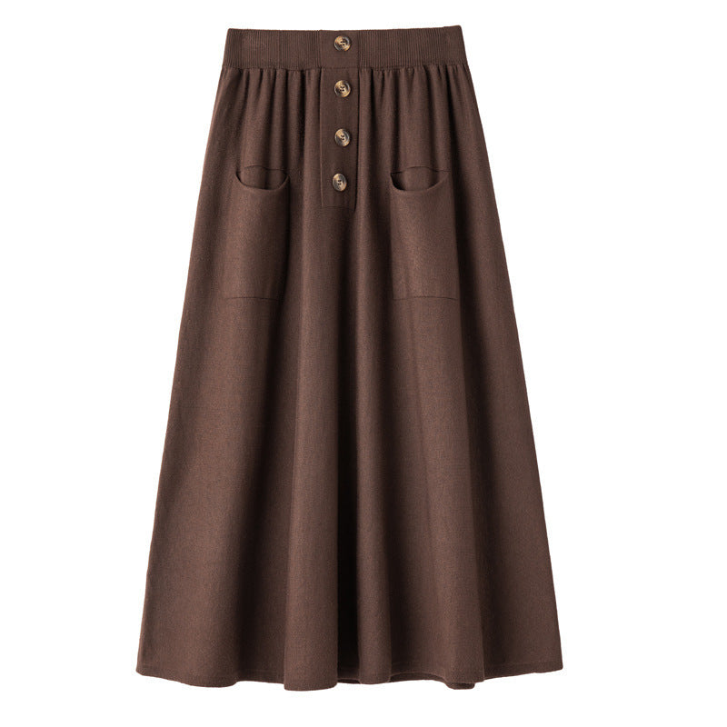 Women's midi skirt made of wool blend with A-line, elastic ribbed waistband, decorative button placket, and patch pockets Mune Fashion