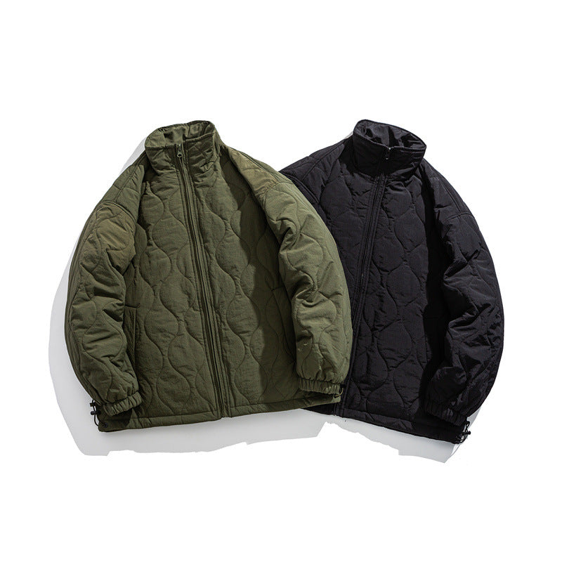 Unisex Boxy quilted jacket in military liner style with high stand-up collar and adjustable hem Mune Fashion