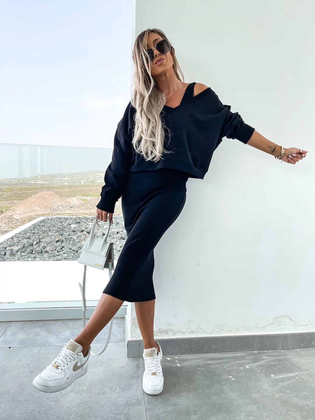 Ladies two-piece midi skirt set with off-shoulder oversized sweatshirt and figure-hugging pencil skirt Mune Fashion