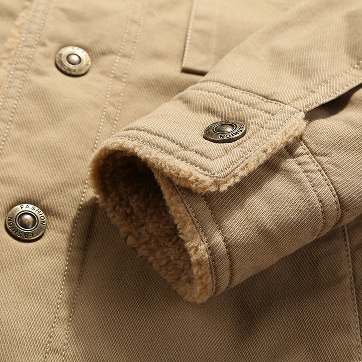 Men's robust canvas work jacket with complete Sherpa lining, concealed snap button placket, and functional chest and side pockets Mune Fashion