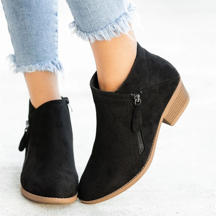 Women’s ankle boot in Western style with side zipper and mid-high block heel Mune Fashion