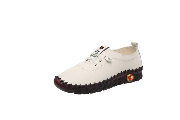 Women's hand-sewn moccasin loafers with elastic lacing, padded comfort insole, and patterned rubber sole Mune Fashion