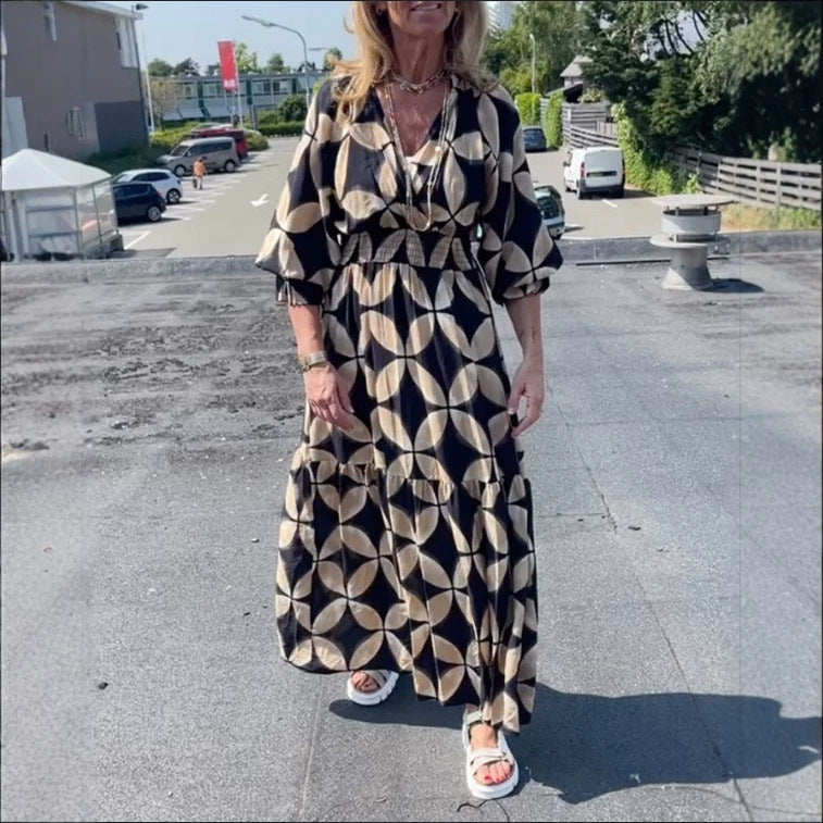 Women's maxi dress with geometric all-over print, smocked waist and ruffled tiers Mune Fashion