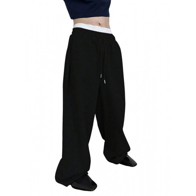 Women's wide oversize jogging pants with a deep crotch, elastic waistband, and drawstring Mune Fashion