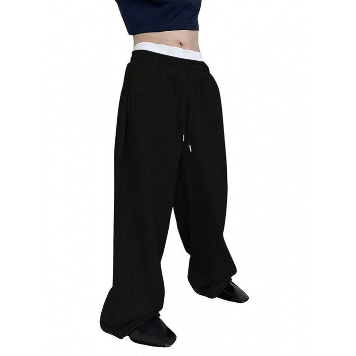 Women's wide oversize jogging pants with a deep crotch, elastic waistband, and drawstring Mune Fashion