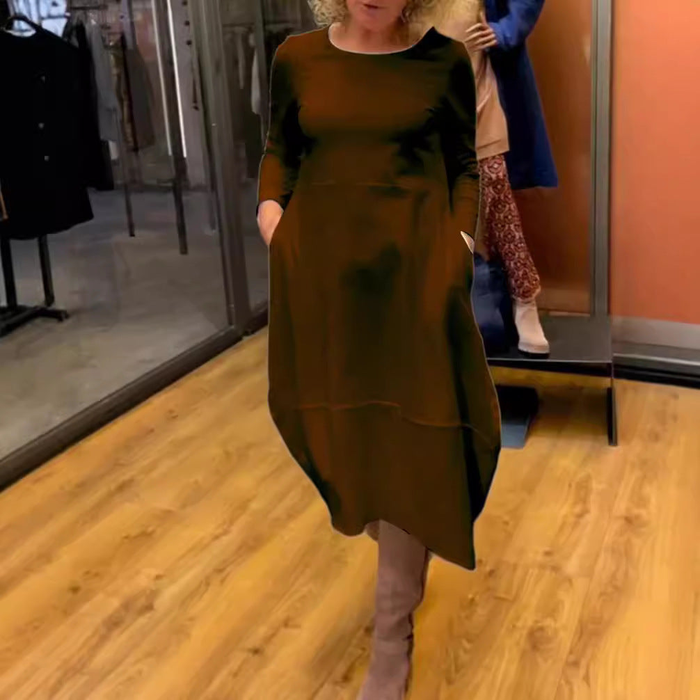 Women's asymmetrical balloon dress with three-quarter sleeves, side pockets, and flowing pointed hem Mune Fashion