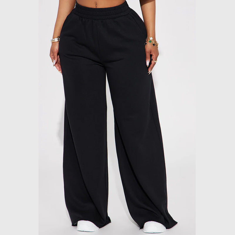 Ladies high-waist palazzo trousers made of French terry with wide legs, elastic comfort waistband and open hem edges Mune Fashion