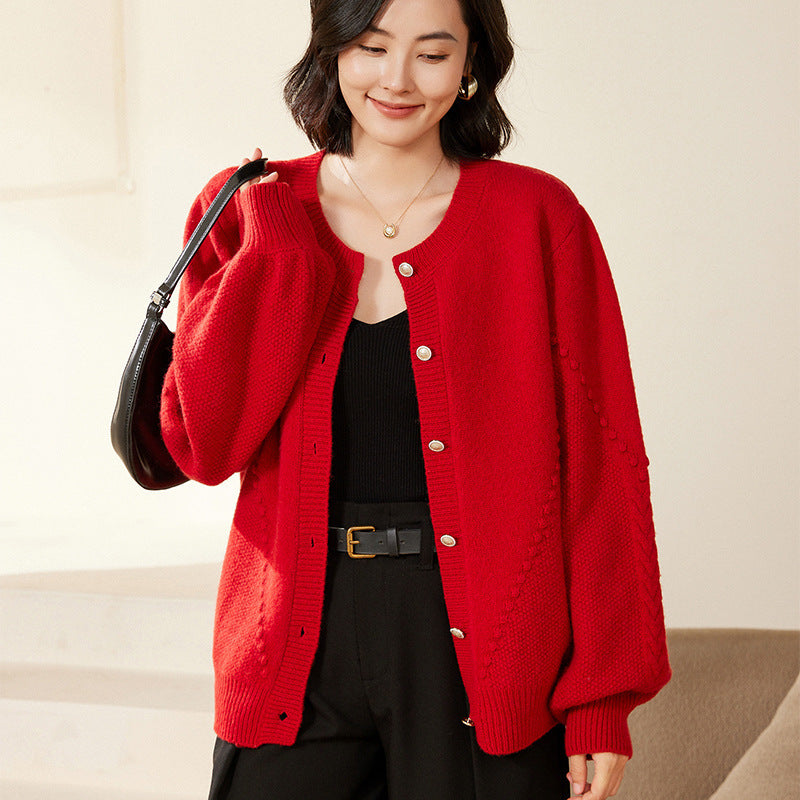 Women's knitted cardigan with textured pattern, balloon sleeves and pearly button placket Mune Fashion
