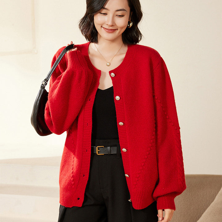 Women's knitted cardigan with textured pattern, balloon sleeves and pearly button placket Mune Fashion