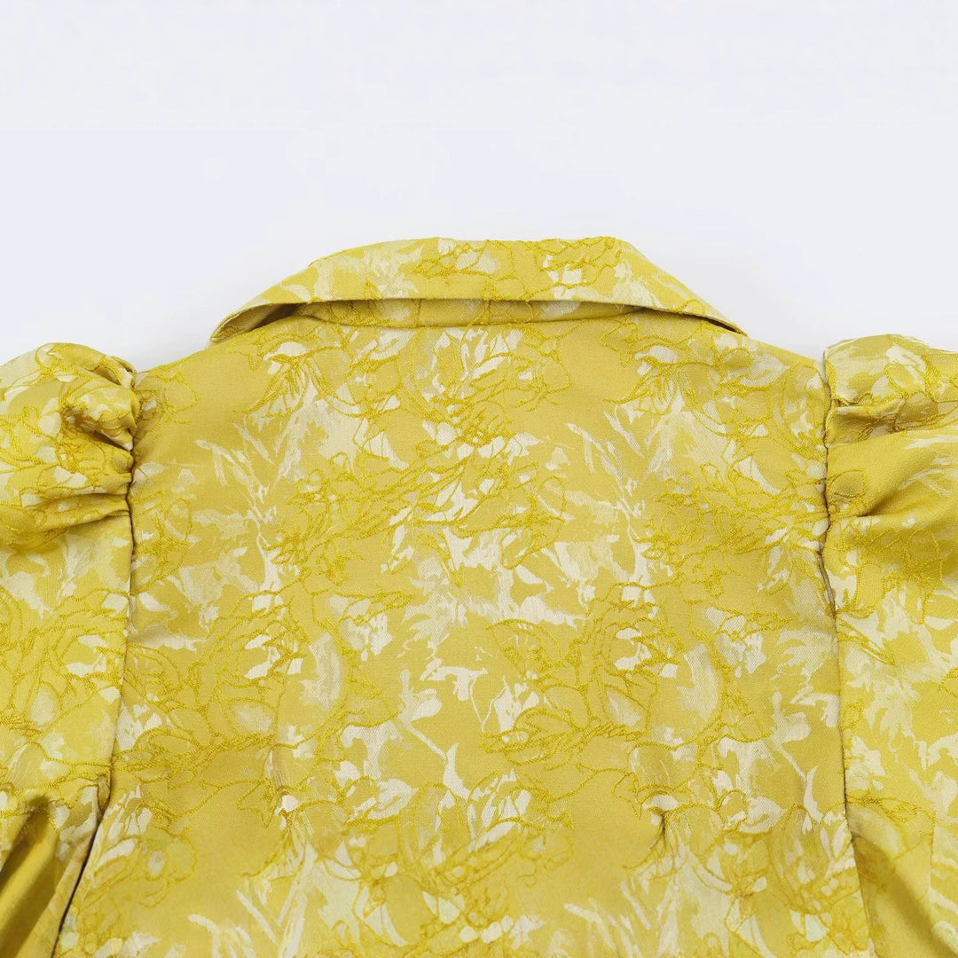 Women's midi dress made of jacquard with puff sleeves, lapel collar, and fitted A-line cut Mune Fashion