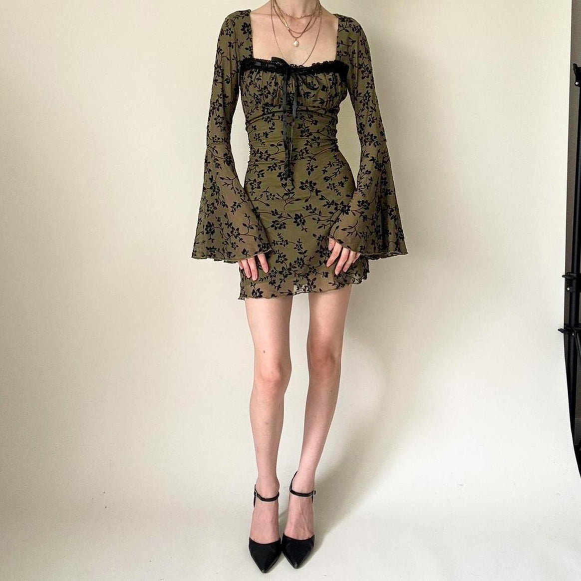 Women's chiffon mini dress with velvet flock floral pattern, empire waist and bell sleeves Mune Fashion